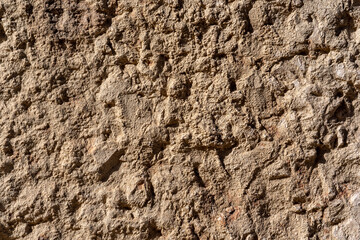 texture of a natural rough-cut stone of an ancient building