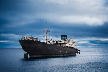 Old ship wrecked on the coast, abandoned on the beach, her name was Telamon. 