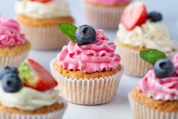 Cupcakes with berries close up