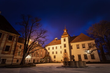 Fototapeta na wymiar At the Courtyard of Trebon Castle - Czech Republic. Winter night.