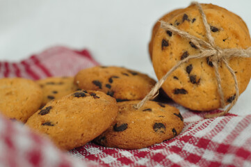 sweet crunchy cookies with dark chocolate for teatime