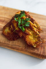 vegan fried bread crumbed zucchini slices, healthy plant-based food