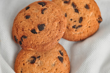 sweet crunchy cookies with dark chocolate for teatime