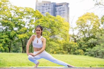 asian woman play yoga in the garden. Sports healthy lifestyle concepts.