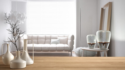 Wooden table top or shelf with minimalistic modern vases over blurred minimalist scandinavian living room, white interior design