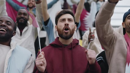 Excited man watching football match on stadium