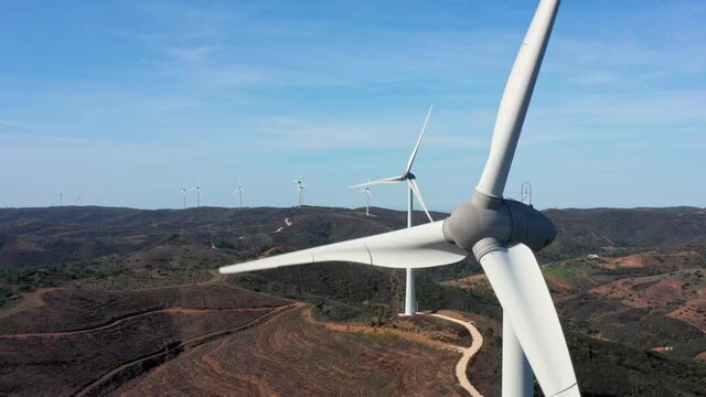 Generating clean green electricity from wind turbine generators in the Portuguese mountainous area. Caring for the environment and nature.
