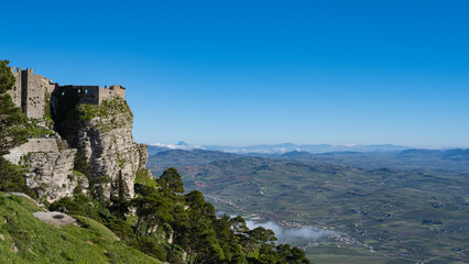 Fototapeta na wymiar Erice, Sicily, Italy. Glimpse of the castle of Venus with a view of the valley