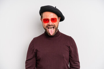 middle age man feeling disgusted and irritated and tongue out. actor artist concept