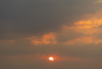 Fototapeta premium Sunset sky. Abstract nature background. Dramatic blue with orange colorful clouds in twilight time.