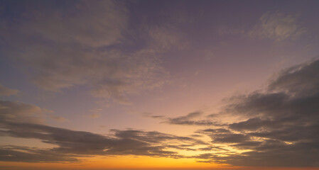 Sunset sky. Abstract nature background. Dramatic blue with orange colorful clouds in twilight time.