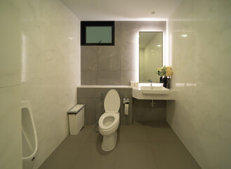 Public toilet. men bathroom doors in restroom in restaurant or hotel or shopping mall, empty interior decoration design