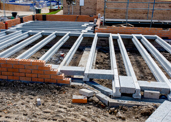 Beam and block ground floor system being installed during construction of new residential house