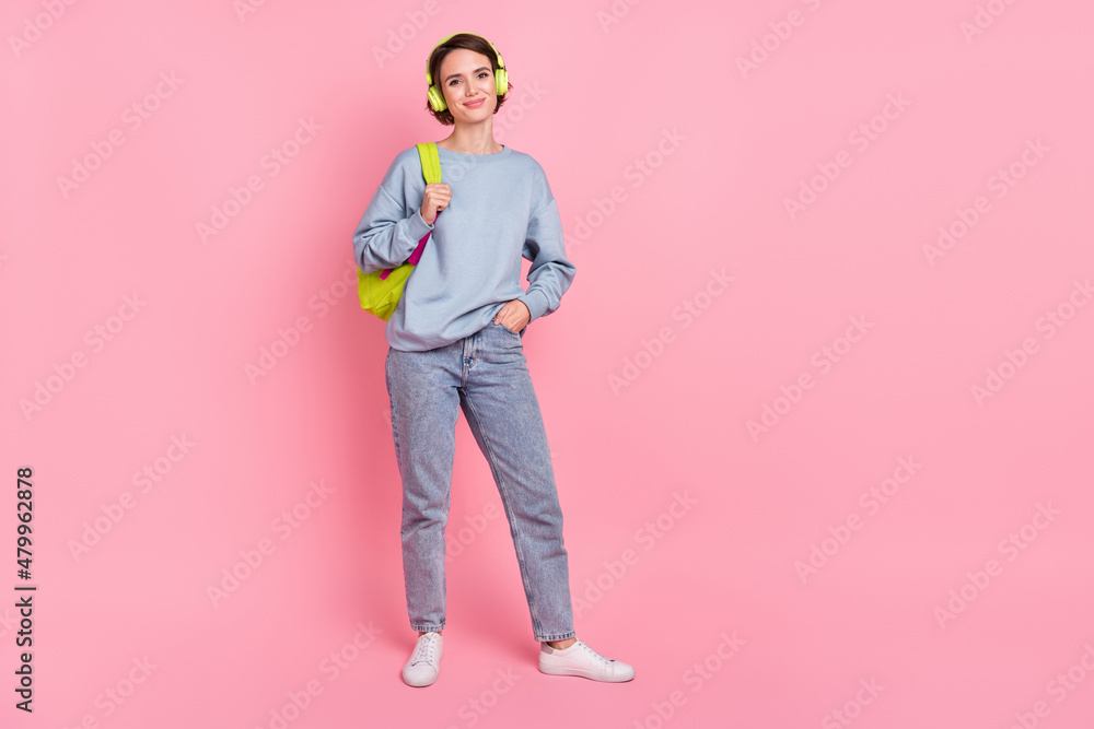 Sticker Full length photo of pretty young lady wear pullover jeans footwear headphones bag isolated on pink background