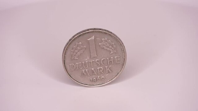 Several coins of the no longer current currency Deutsche Mark from Germany.