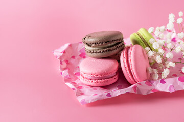 Macarons of Different Color on Pink Background Horizontal Copy Space