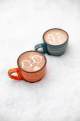 Coffee cup with cream or milk, top view on beautiful white snow background. Great picture for baner or menu