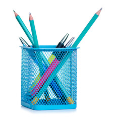 Pens and pencils in metal pot stand on white background isolation