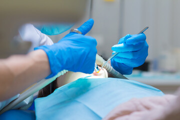 Dentistry. Dental treatment for children in the clinic under sedation.