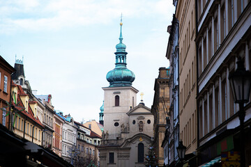Fototapeta premium Tourist street in a picturesque section of Old Town Prague, Czech Republic.