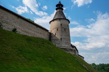 The fortress wall of the historical and architectural complex in the old city of Pskov preserved from the 12th century, Russia.