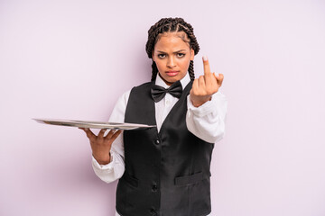 afro black woman feeling angry, annoyed, rebellious and aggressive. waiter with a tray