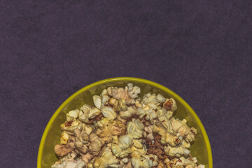 A close-up shot of a bowl with popcorn