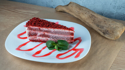 Fresh strawberry cheesecake with mint leaf on white plate. fresh strawberry cake from above.