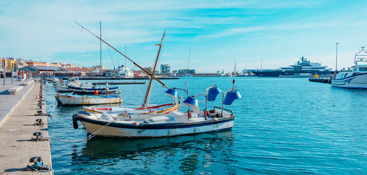 boats at the port of Tarragona, Spain, web banner