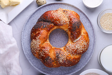 Russian national bread Kalach on a gray background.