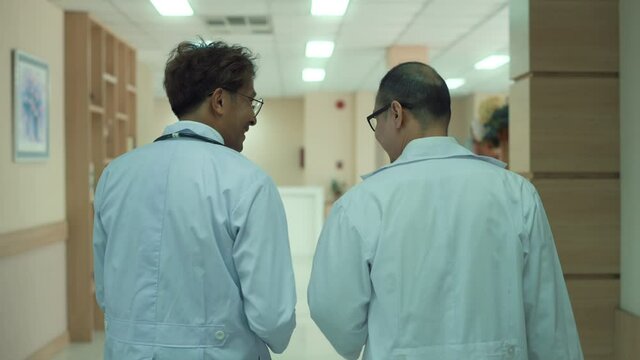 Asian Doctors are working in hospital , medical health care concept
