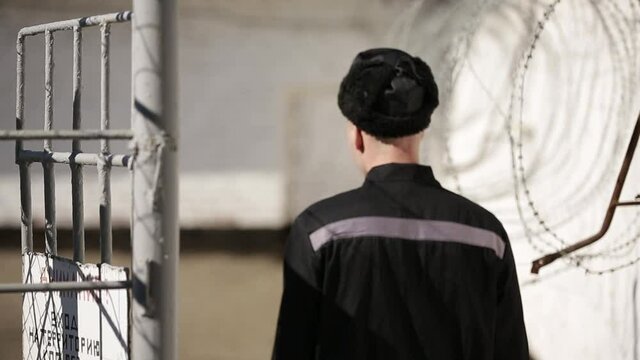 Prisoner entering to prison door