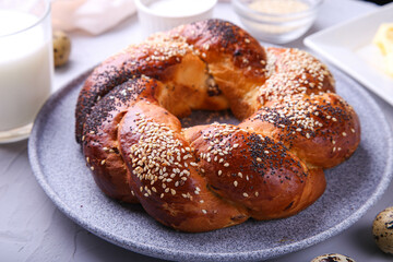 Russian national bread Kalach on a gray background.