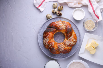Russian national bread Kalach on a gray background with place for text. Top view