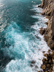 waves crashing on rocks