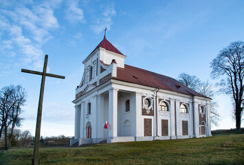 Built in 1825, the Catholic church of Divine Providence in the village of Siderka in Podlasie, Poland. The photos show a general view of the temple and architectural details close-up. - obrazy, fototapety, plakaty