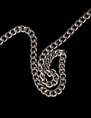 Silver chain isolated on black background.