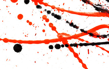 Black and red drops of paint on a white background.