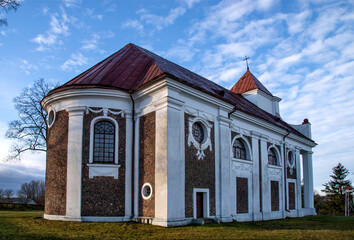 Built in 1825, the Catholic church of Divine Providence in the village of Siderka in Podlasie, Poland. The photos show a general view of the temple and architectural details close-up. - obrazy, fototapety, plakaty