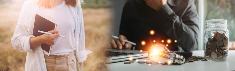 Businessman touching a bright light bulb. Concept of Ideas for presenting new ideas Great inspiration and innovation new beginning.