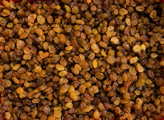 Appetizing light brown raisins, natural sweets, healthy food