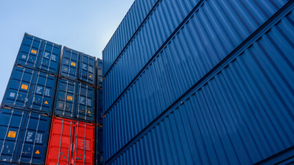 Stack of blue containers box, Cargo freight ship for import export logistics service and...