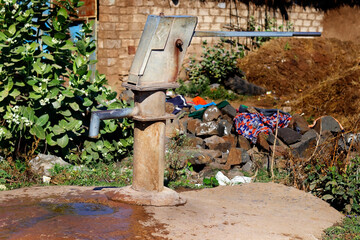 Classic hand pump for Water Hand Pump in The Gir forest Village Gujarat India. Stock Photos and Images