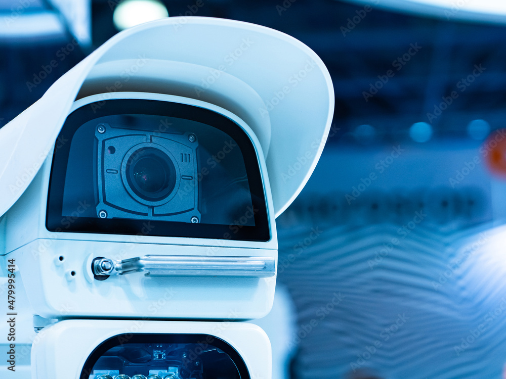 Poster cctv surveillance camera. fragment of security system close-up. fragment of external video surveilla