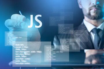 Javascript Development of programs. JS label on virtual screen. Businessman reaches for javascript...