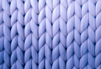 Background with gradient. Jersey in lilac and purple merino wool. Rough weave. Pigtails pattern.	