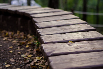 sidewalk from wooden boards close-up, stretching into distance