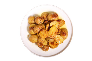 Potatoes baked in the oven stand on a white background