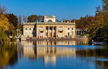 Fototapeta na wymiar Royal Palace on the Isle Palac na Wodzie known as Baths Palace in Royal Lazienki Krolewskie park in Ujazdow district of Warsaw in Poland