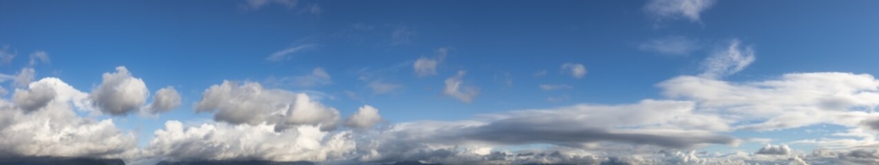Panoramic View of Cloudscape during a cloudy blue sky sunny day. Taken on the West Coast of British...